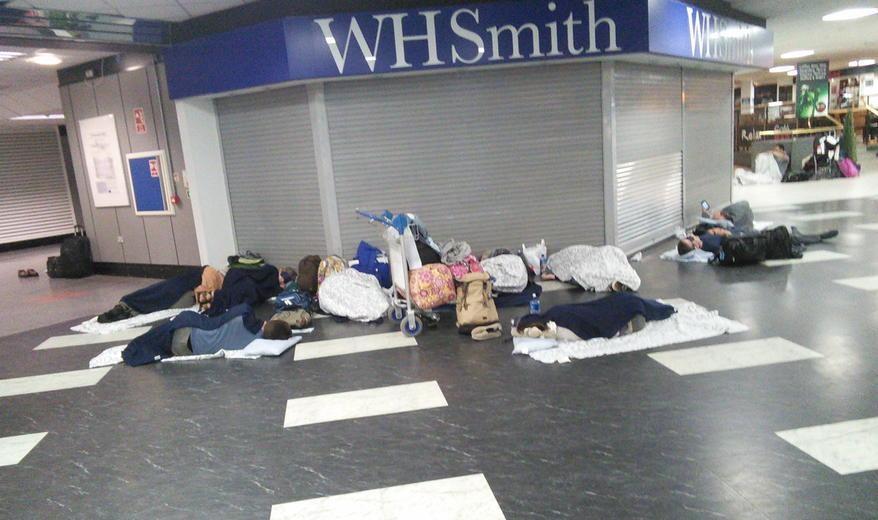 United Passengers Sleeping at BFS (Photo: @MTRafferty Twitter)