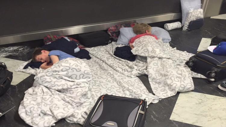 United Passengers Sleeping at BFS (Photo: Chicago Tribune via WGN-TV)