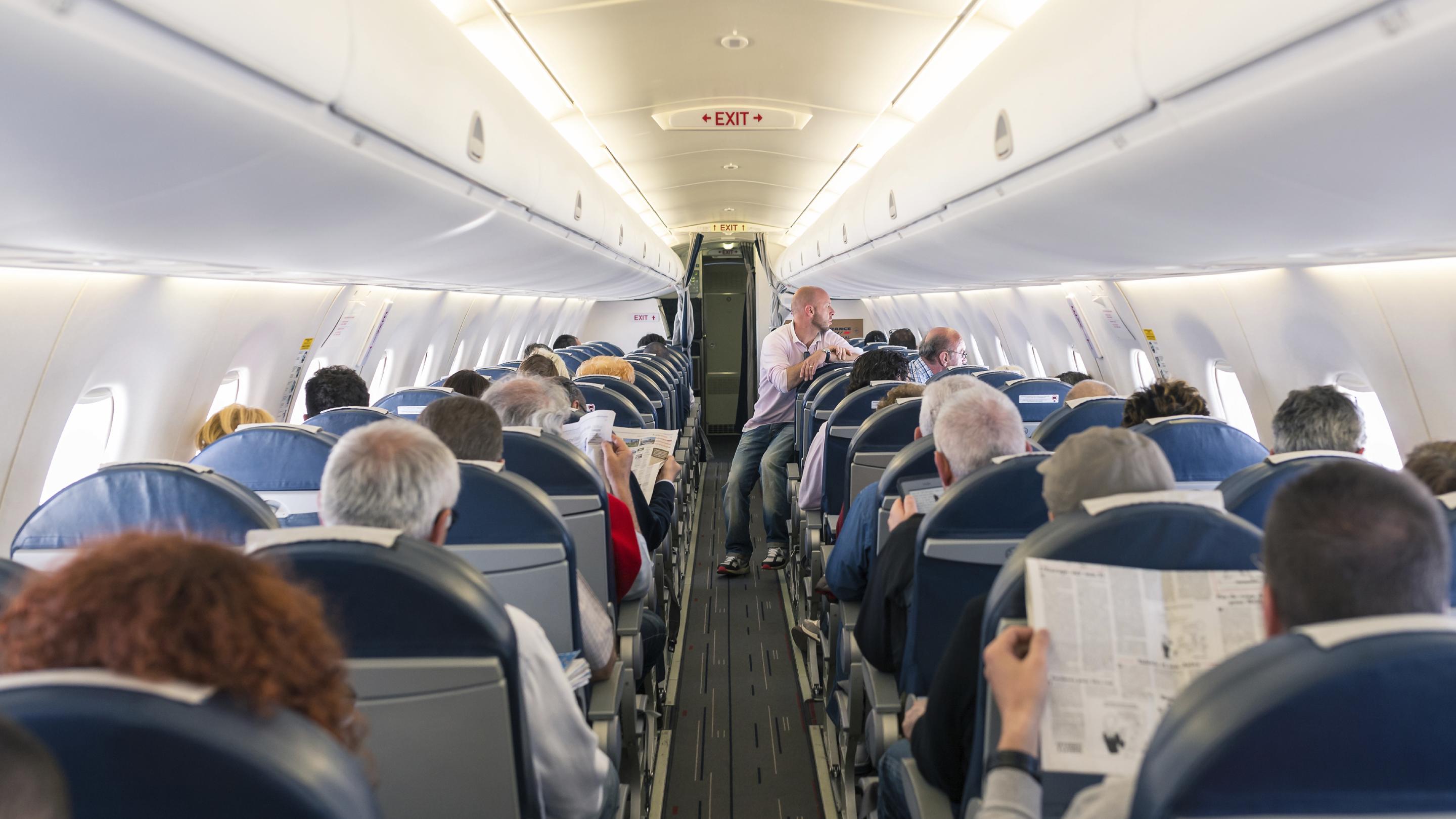 passengers onboard a plane (photo: istock)