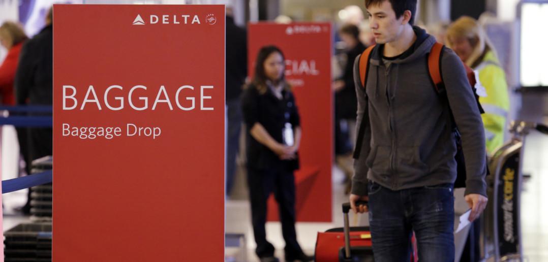 Delta's "Early Valet" Service (Photo: Elaine Thompson/AP via Seattle Times)