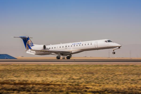 An ExpressJet-United Express Embraer ERJ145 departs from Denver International Airport. ExpressJet's union announced the airline lost their contract with United to operate regional routes. Photo courtesy: ExpressJet