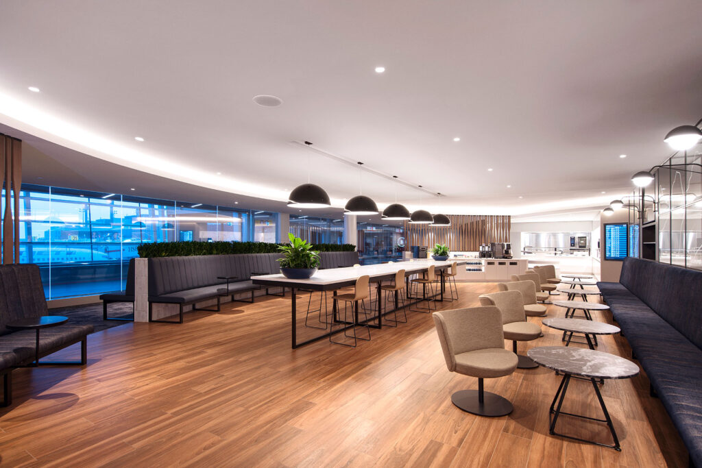 The lounge dining area, capped by the open buffet at the end. Image courtesy: WestJet